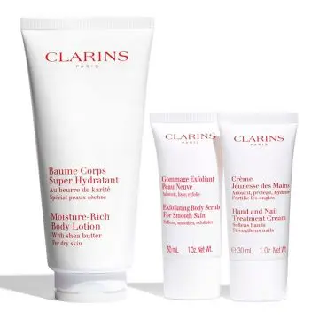 Coffret Rituel Peau Neuve Baume Corps, Gommage Corps, Crème Mains & Trousse  - Clarins - Soin - Visuel 2